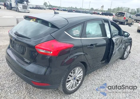 2015 Ford Focus Titanium из США, поврежденный, VIN 1FADP3N21FL217532